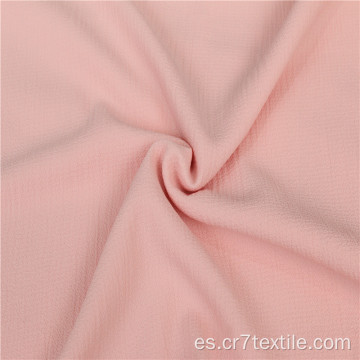 Tela de blusa para niñas de gasa burbuja teñida en rosa bebé